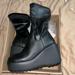 Steve Madden Proceed wedge boots in black